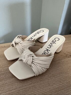 Calvin Klein Ivory Knotted-Strap Block Heel Mules